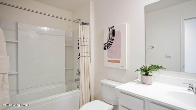 full bathroom featuring vanity, shower / tub combo with curtain, and toilet