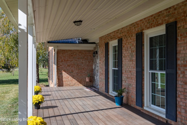 deck with covered porch