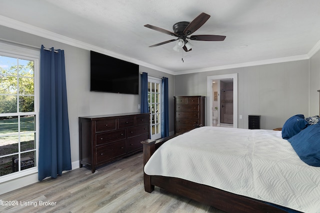 bedroom with ensuite bath, ornamental molding, light hardwood / wood-style floors, and ceiling fan