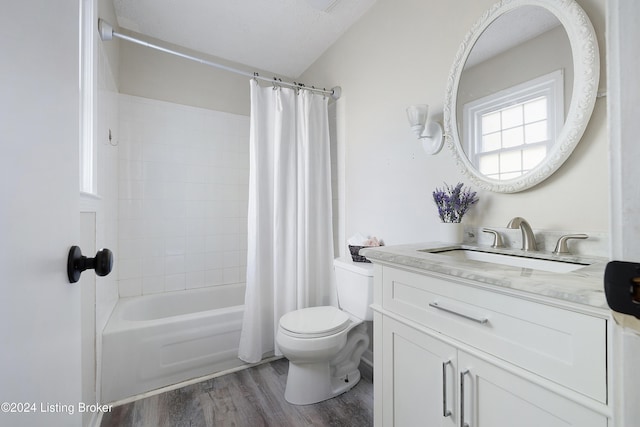 full bathroom featuring vanity, toilet, wood-type flooring, and shower / bath combination with curtain