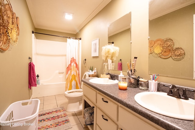 full bath featuring double vanity, ornamental molding, tile patterned flooring, and a sink