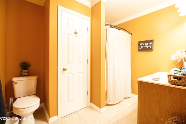 full bath with ornamental molding, baseboards, toilet, and tile patterned floors