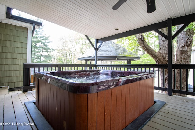 1353 Ferrill Hill Rd, Buffalo, KY 42716 - wooden deck featuring ceiling fan and a hot tub