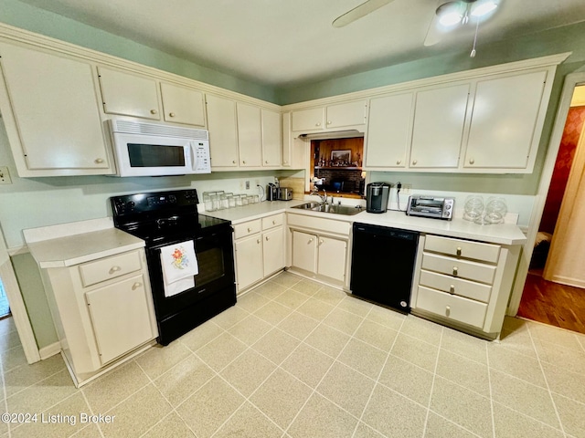 kitchen featuring black appliances, sink, cream cabinetry, light wood-type flooring, and ceiling fan