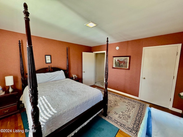 bedroom featuring wood-type flooring