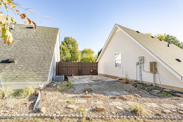 175 Boone White Rd, Leitchfield, KY 42754 - view of property exterior featuring roof with shingles, central AC, and a patio