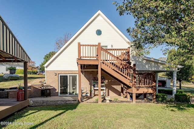 175 Boone White Rd, Leitchfield, KY 42754 - back of house with a wooden deck, stairway, a yard, and brick siding