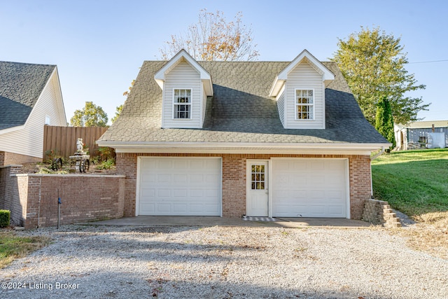 garage with a lawn