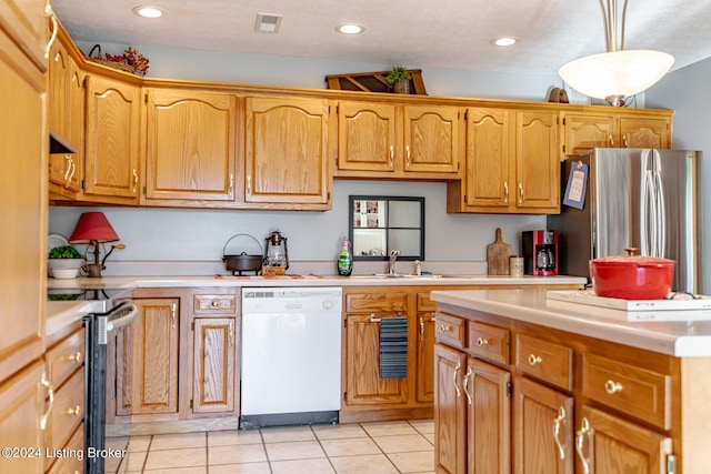 175 Boone White Rd, Leitchfield, KY 42754 - kitchen with appliances with stainless steel finishes, light countertops, a sink, light tile patterned flooring, and recessed lighting