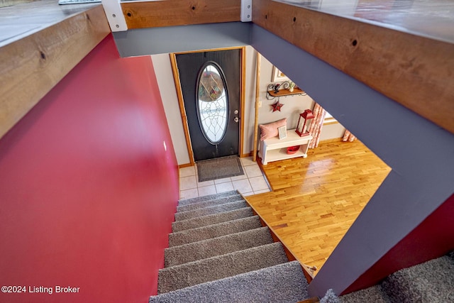 175 Boone White Rd, Leitchfield, KY 42754 - entrance foyer with stairway, baseboards, and wood finished floors