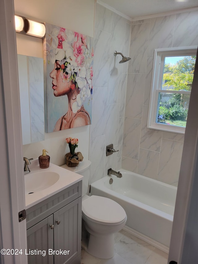 full bathroom with toilet, vanity, and tiled shower / bath