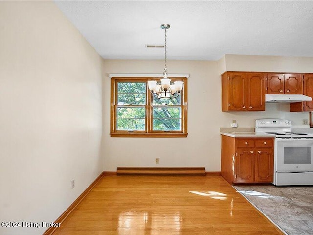 kitchen with baseboard heating, hanging light fixtures, white range with electric cooktop, light wood-type flooring, and an inviting chandelier