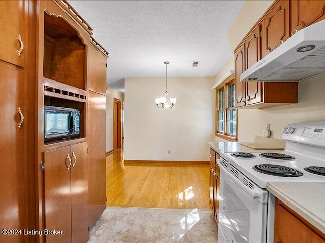 kitchen with light wood-type flooring, a textured ceiling, white electric stove, pendant lighting, and an inviting chandelier