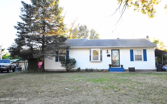 ranch-style house with a front yard