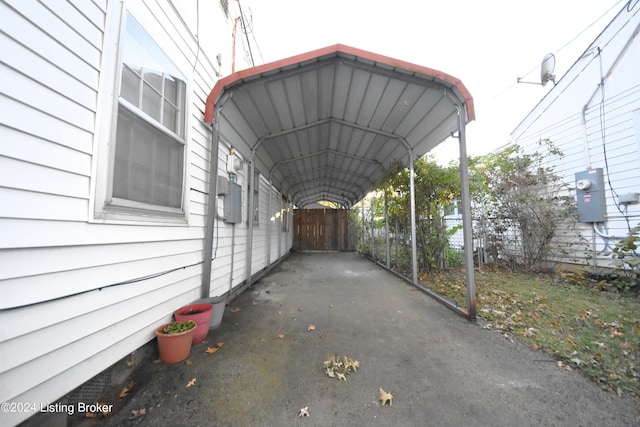 view of parking with a carport