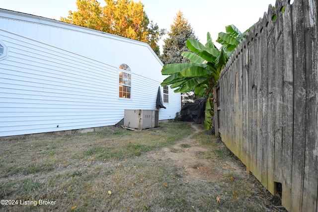 view of home's exterior with central AC