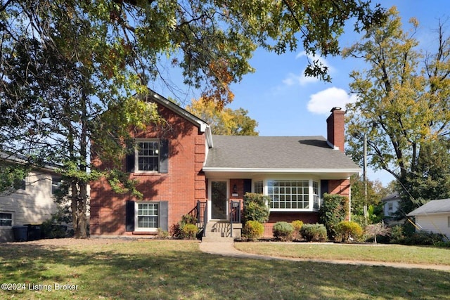 view of front facade with a front lawn