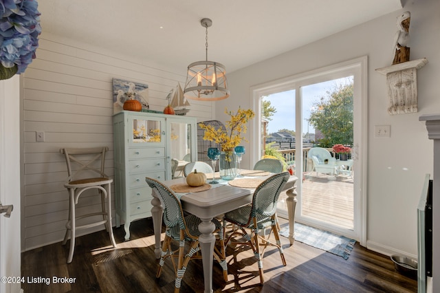 dining space with dark wood-type flooring