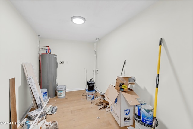 interior space featuring water heater and light wood-type flooring