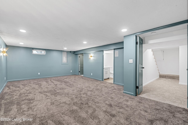 basement with light carpet