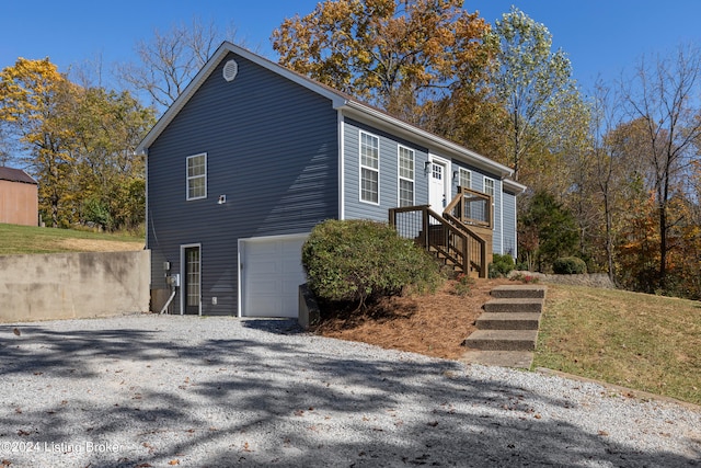 view of home's exterior with a garage