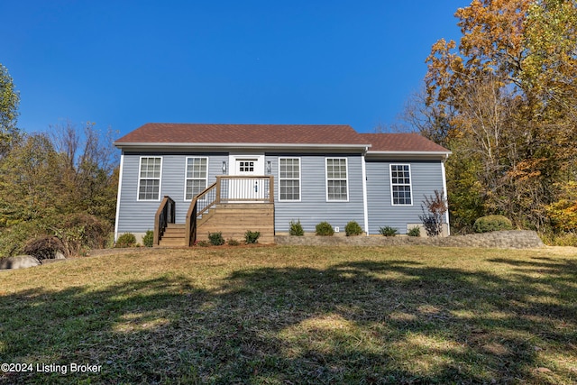 view of front of home with a front lawn