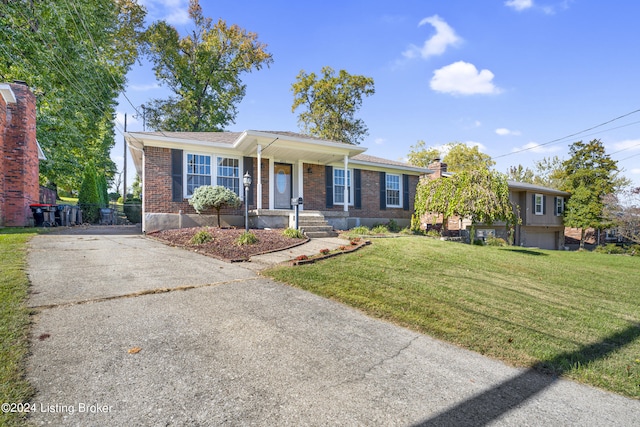 ranch-style home featuring a front lawn