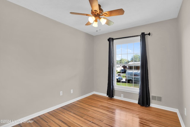 unfurnished room featuring ceiling fan and light hardwood / wood-style flooring