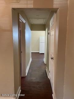 hallway featuring dark hardwood / wood-style floors