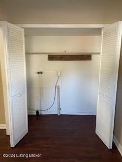 washroom with dark hardwood / wood-style flooring