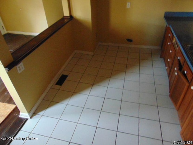 interior space with light tile patterned floors