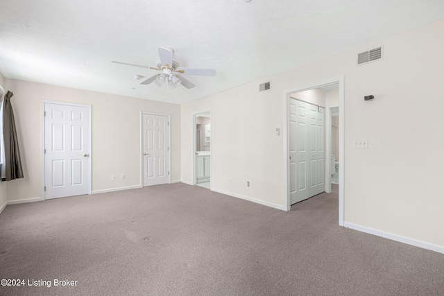 carpeted empty room with ceiling fan