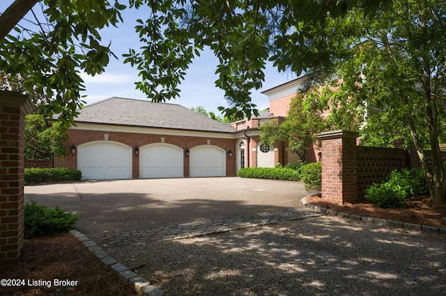 view of front of property with a garage