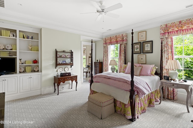 bedroom with ceiling fan and crown molding