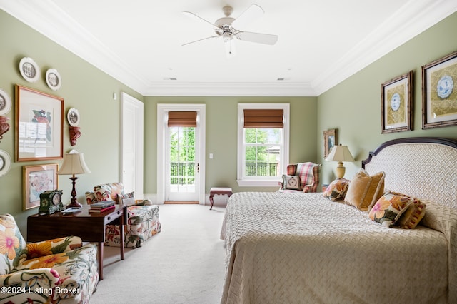 carpeted bedroom featuring crown molding, access to exterior, and ceiling fan