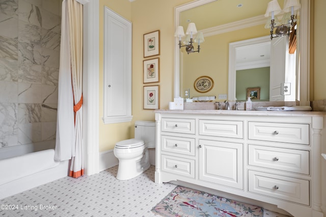 bathroom featuring vanity, crown molding, and toilet