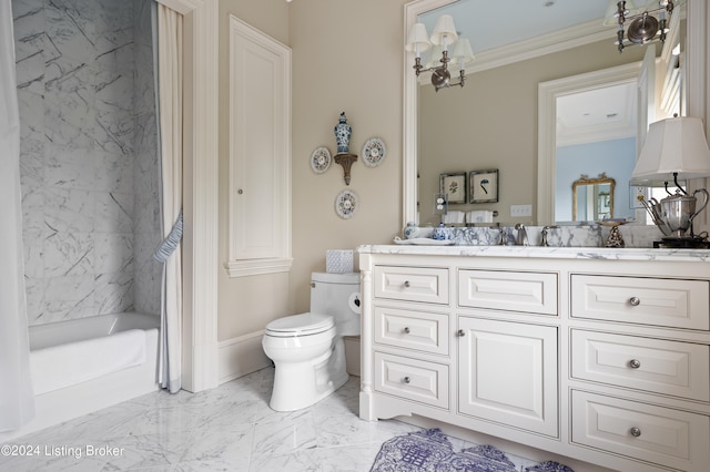 bathroom with vanity, toilet, and ornamental molding