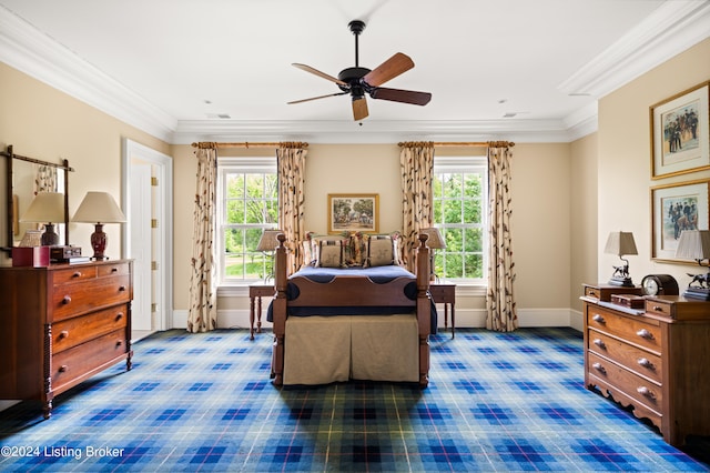 carpeted bedroom featuring crown molding and ceiling fan