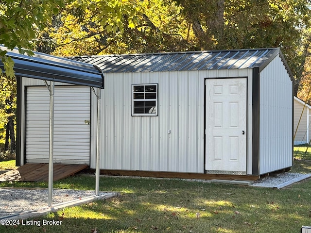 view of outbuilding with a lawn