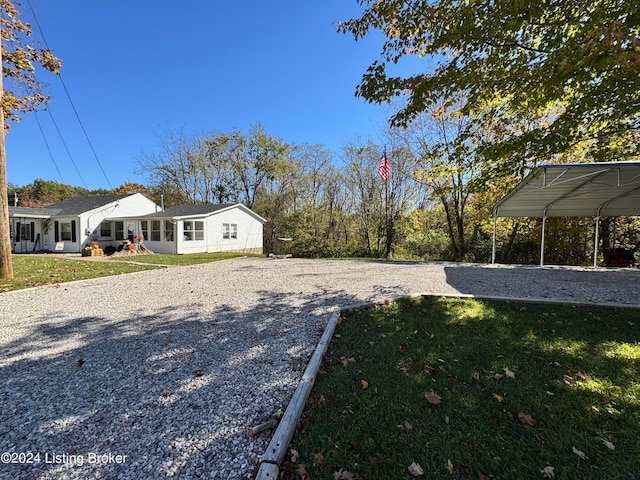 view of yard with a carport