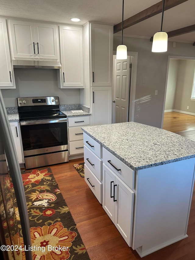 kitchen with stainless steel electric stove, hanging light fixtures, white cabinetry, light stone countertops, and dark hardwood / wood-style floors