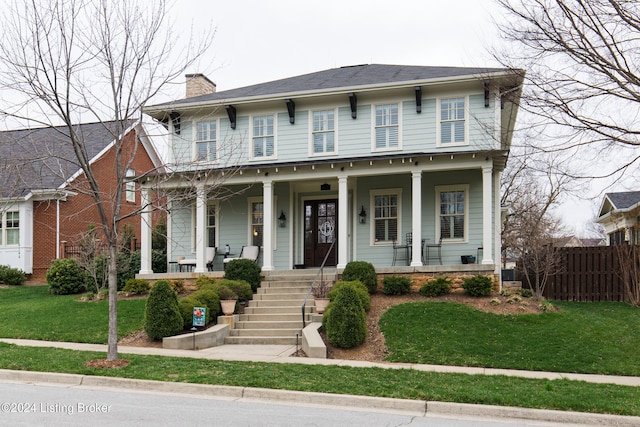 view of front of property with a front yard