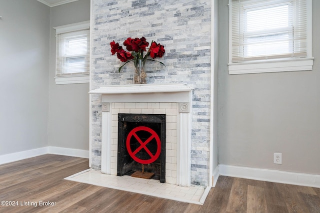 details featuring crown molding and hardwood / wood-style floors