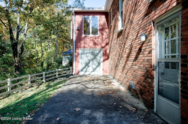 view of property exterior with a garage