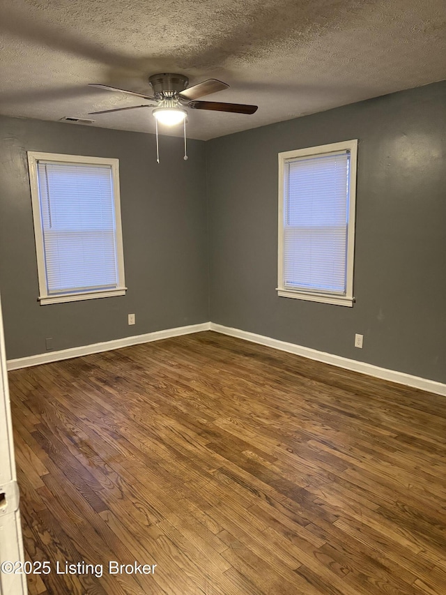 unfurnished room featuring hardwood / wood-style flooring, a textured ceiling, and ceiling fan