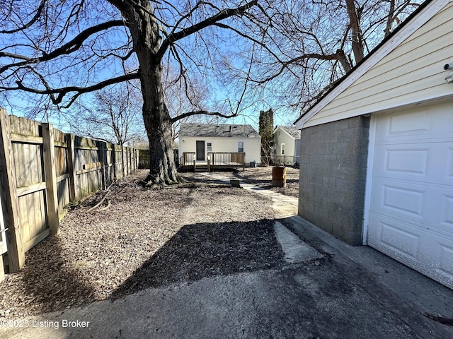 view of yard featuring a garage