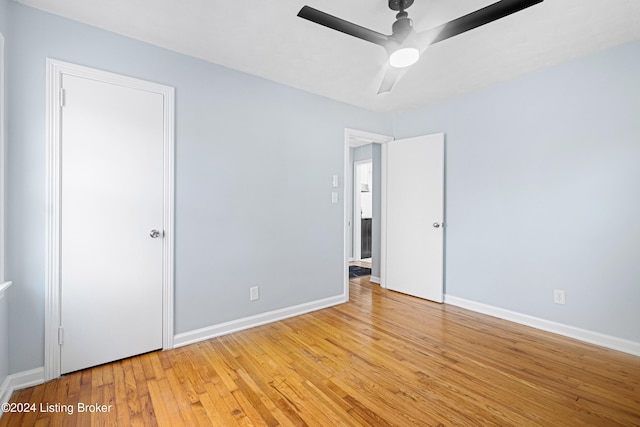 unfurnished bedroom with light wood-type flooring and ceiling fan