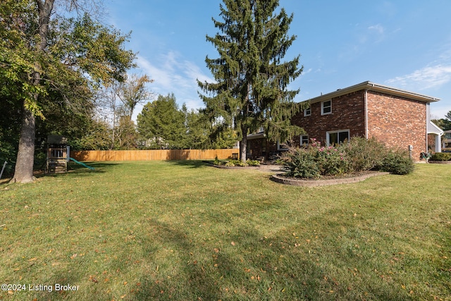 view of yard featuring a playground