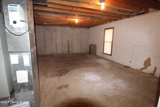 basement featuring heating unit