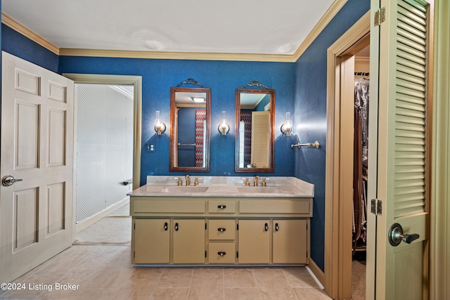 bathroom with vanity and ornamental molding